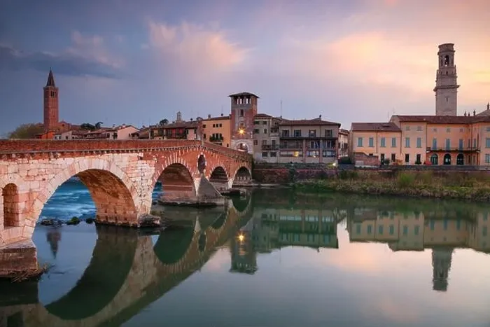 Framed Print : Verona, Italy. Cityscape image of beautiful Italian town Verona with the Stone Bridge over Adige River at sunset
