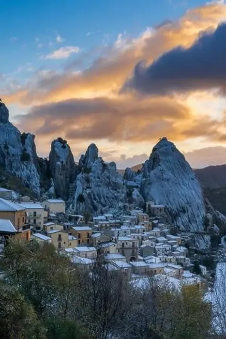 Framed Print : Vertical view of Castlemzzano village in winter with a colourful sunrise sky above Framed Print : Vertical view of Castlemzzano village in winter with a colourful sunrise sky above
