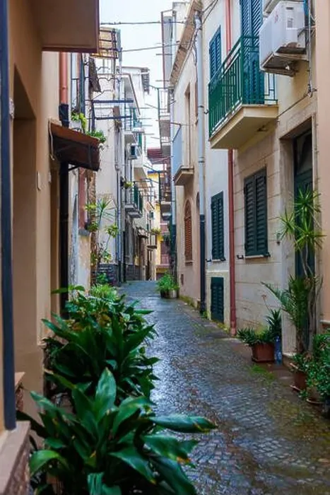 Framed Print : Vico Raffaele Piria, a pretty cobbled lane in Scilla, Calabria, southern Italy, on an unseasonably wet morning Framed Print : Vico Raffaele Piria, a pretty cobbled lane in Scilla, Calabria, southern Italy, on an unseasonably wet morning