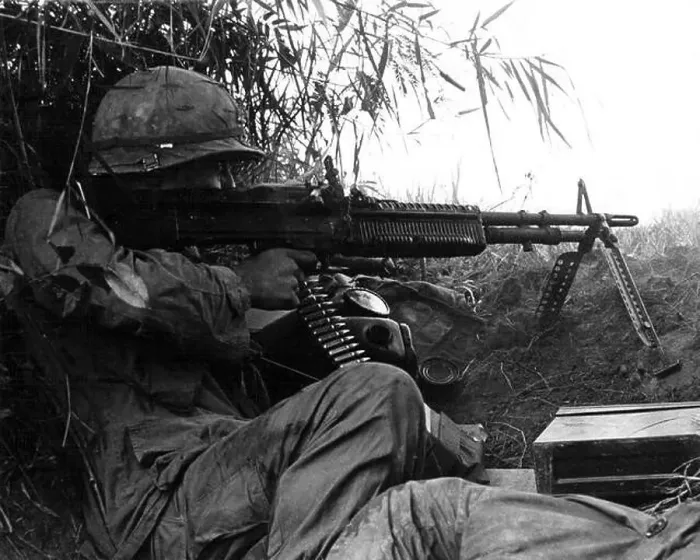 Framed Print : Vietnam: US Army Sergeant Gerald Laird of the 101st Airborne Division firing a machine gun during an engagement in Framed Print : Vietnam: US Army Sergeant Gerald Laird of the 101st Airborne Division firing a machine gun during an engagement in