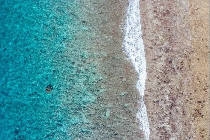 Framed Print : Top view aerial photo from flying drone. Beautiful beach. Aerial view of calm waves, breaking at coral reef. Exotic ocean beach, tropical landscape Framed Print : Top view aerial photo from flying drone. Beautiful beach. Aerial view of calm waves, breaking at coral reef. Exotic ocean beach, tropical landscape
