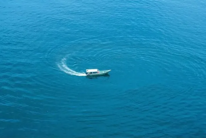 Framed Print : Top view, aerial view wooden fishing boat on the beach from a drone Framed Print : Top view, aerial view wooden fishing boat on the beach from a drone