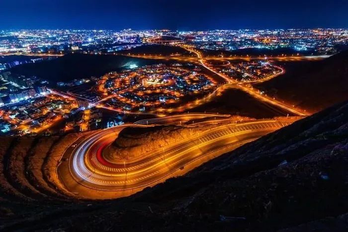 Framed Print : View from Amirat view point on wavy road in Muscat at night Framed Print : View from Amirat view point on wavy road in Muscat at night