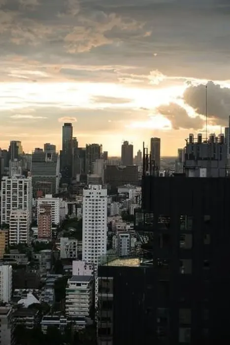 Framed Print : View of the bangkok skyline at sunset from the Sukhumvit area on a sunny day, Thailand Framed Print : View of the bangkok skyline at sunset from the Sukhumvit area on a sunny day, Thailand