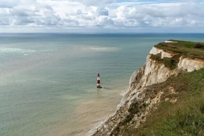 Framed Print : View of the Beachy Head Lighthouse in the English Channel and the white cliffs of the Jurassic Coast Framed Print : View of the Beachy Head Lighthouse in the English Channel and the white cliffs of the Jurassic Coast