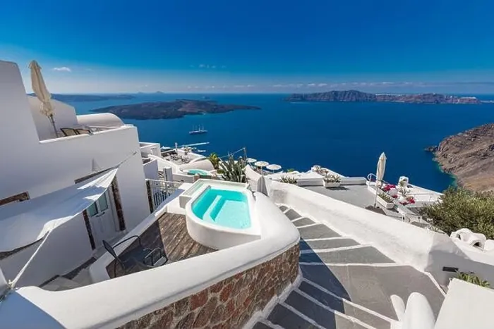 Framed Print : View of caldera and swimming pool, typical white architecture, romantic village on Santorini island, Greece. Summer vacation, cruise ships, sea view Framed Print : View of caldera and swimming pool, typical white architecture, romantic village on Santorini island, Greece. Summer vacation, cruise ships, sea view