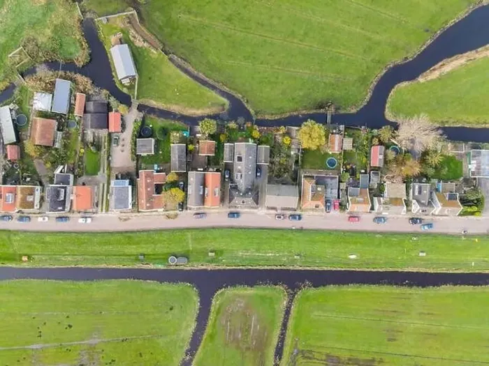 Framed Print : Top down view of dike houses and river grass the netherlands Holland natural housing a long the water classic Framed Print : Top down view of dike houses and river grass the netherlands Holland natural housing a long the water classic