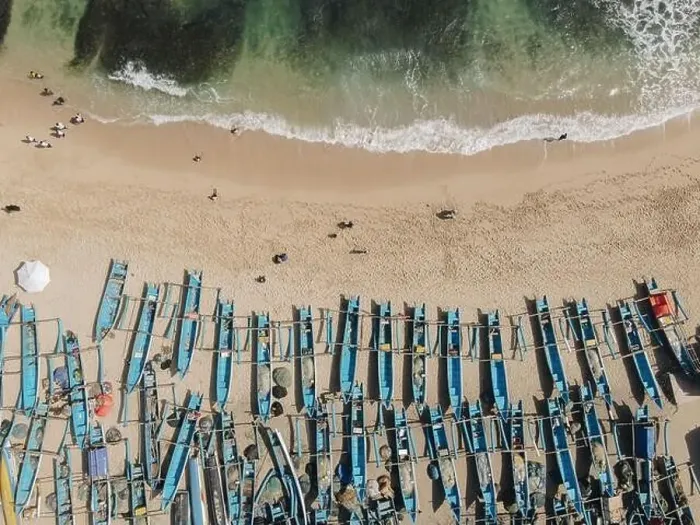 Framed Print : Top view of Drini Beach in Gunungkidul, Yogyakarta, Indonesia with many blue boats on the sand Framed Print : Top view of Drini Beach in Gunungkidul, Yogyakarta, Indonesia with many blue boats on the sand