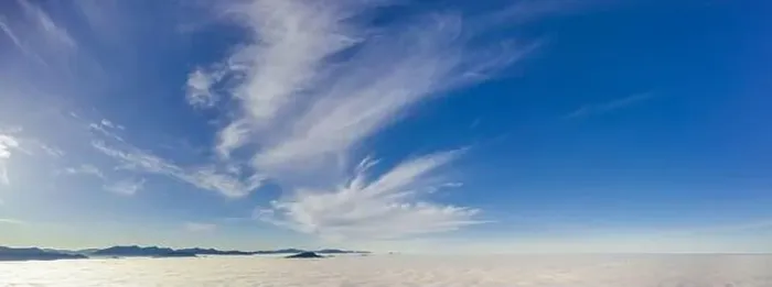 Framed Print : View from the drone at dawn over the clouds with mountains on the grassland Framed Print : View from the drone at dawn over the clouds with mountains on the grassland