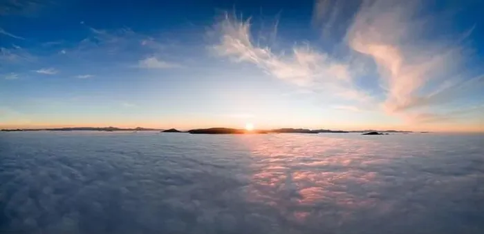 Framed Print : View from the drone at dawn over the clouds with mountains on the grassland Framed Print : View from the drone at dawn over the clouds with mountains on the grassland