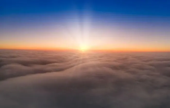 Framed Print : View from the drone at dawn over the clouds with mountains on the grassland Framed Print : View from the drone at dawn over the clouds with mountains on the grassland