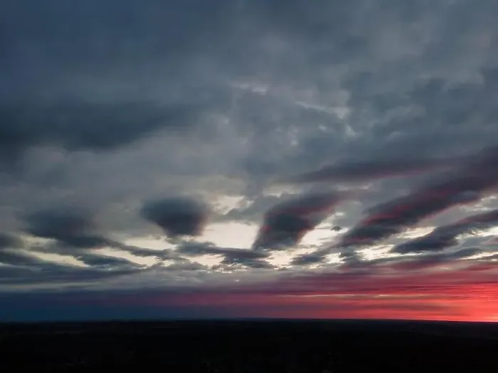 Framed Print : View from drone, panorama orange sky and gray clouds, sun at sunset Framed Print : View from drone, panorama orange sky and gray clouds, sun at sunset