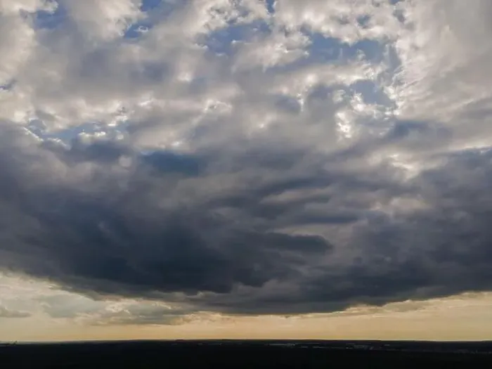 Framed Print : View from drone, panorama orange sky and gray clouds, sun at sunset Framed Print : View from drone, panorama orange sky and gray clouds, sun at sunset