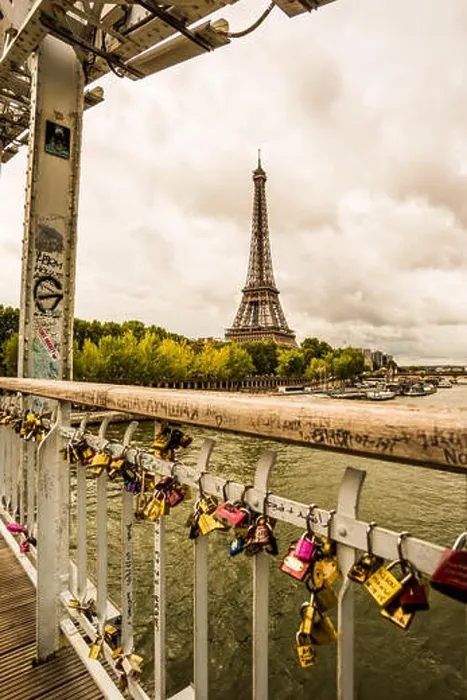 Framed Print : A view of the Eiffel Tower from a love lock bridge in the city of Paris France Framed Print : A view of the Eiffel Tower from a love lock bridge in the city of Paris France