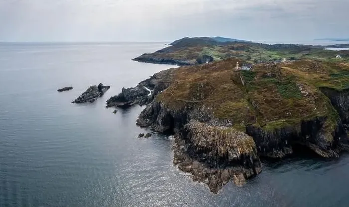 Framed Print : A view of the entrance to the Baltimore Harbor in West Cork and the Sherkin Island Lighthouse Framed Print : A view of the entrance to the Baltimore Harbor in West Cork and the Sherkin Island Lighthouse