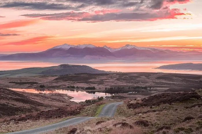 Framed Print : A view of Fairlie Moor Road down onto the Reservoir and Over to Arran. The Sun had just gone behind the Arran Hills and it was a Bitterly cold Day Framed Print : A view of Fairlie Moor Road down onto the Reservoir and Over to Arran. The Sun had just gone behind the Arran Hills and it was a Bitterly cold Day