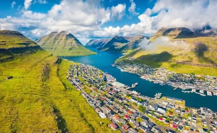 Framed Print : View from flying drone. Captivating summer cityscape of Klaksvik town Framed Print : View from flying drone. Captivating summer cityscape of Klaksvik town