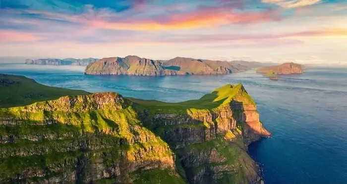 Framed Print : View from flying drone. Colorful sunset on Mykines island Framed Print : View from flying drone. Colorful sunset on Mykines island