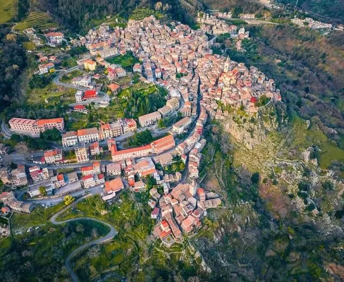 Framed Print : View from flying drone. Top down cotyscape of Novara di Sicilia town