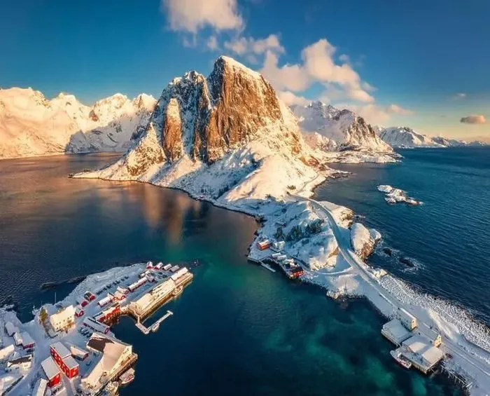 Framed Print : View from flying drone of Hamnoy port with Festhaeltinden mount on background Framed Print : View from flying drone of Hamnoy port with Festhaeltinden mount on background