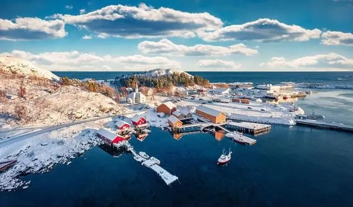 Framed Print : View from flying drone of Moskenes port with Rikets Sal church Framed Print : View from flying drone of Moskenes port with Rikets Sal church