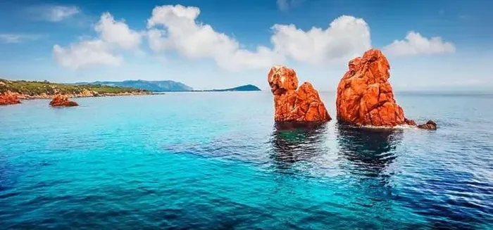 Framed Print : View from flying drone. Panoramic summer view of Red Rocks Gli Scogli Rossi - Faraglioni on the di Cea beach