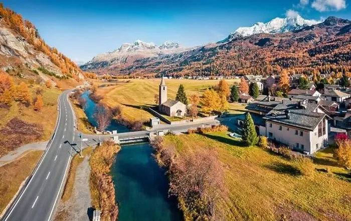 Framed Print : View from flying drone of San Lurench church in Sils im Engadin village Framed Print : View from flying drone of San Lurench church in Sils im Engadin village
