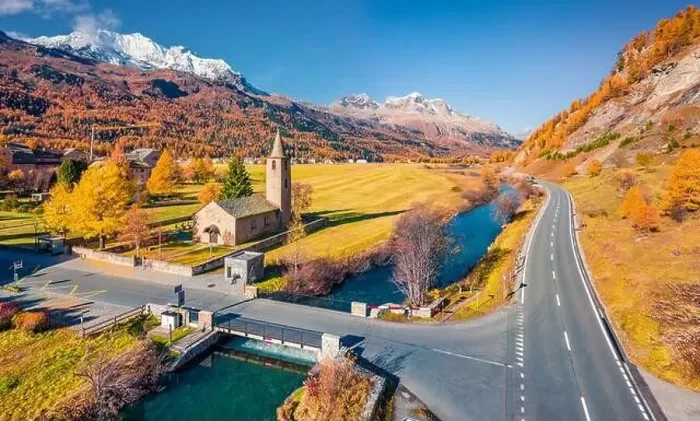 Framed Print : View from flying drone of San Lurench church in Sils im Engadin village Framed Print : View from flying drone of San Lurench church in Sils im Engadin village