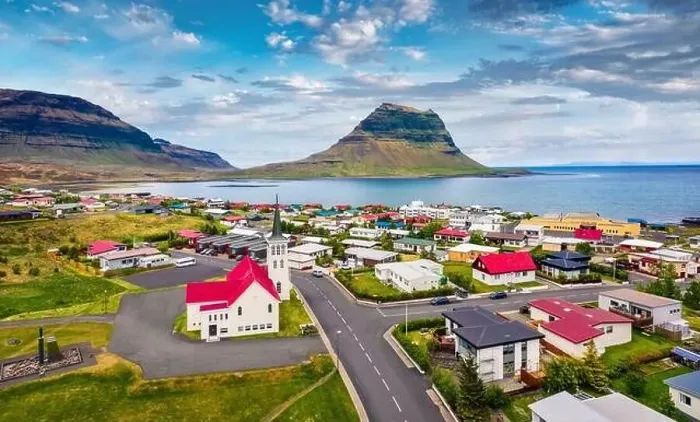 Framed Print : View from flying drone. Splendid morning cityscape of Grundarfjordur town with Kirkjufell Mountain on background Framed Print : View from flying drone. Splendid morning cityscape of Grundarfjordur town with Kirkjufell Mountain on background