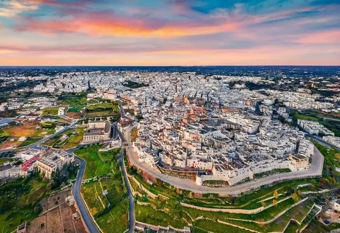 Framed Print : View from flying drone. Splendid morning cityscape of Ostuni town Framed Print : View from flying drone. Splendid morning cityscape of Ostuni town