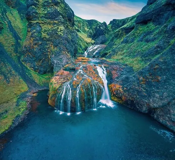 Framed Print : View from flying drone of Stjornarfoss waterfall at midnight sun Framed Print : View from flying drone of Stjornarfoss waterfall at midnight sun