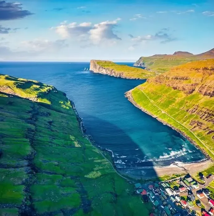 Framed Print : View from flying drone. Sunny summer view of Tjornuvik village with Eidiskollur cliffs on background Framed Print : View from flying drone. Sunny summer view of Tjornuvik village with Eidiskollur cliffs on background