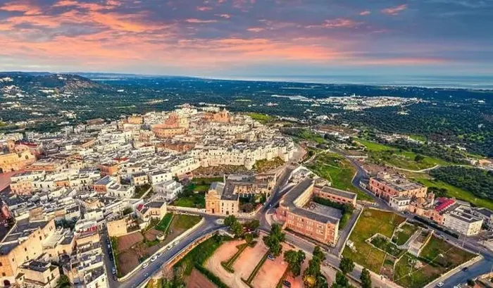 Framed Print : View from flying drone. Unbelievable spring sunrise in Ostuni town Framed Print : View from flying drone. Unbelievable spring sunrise in Ostuni town