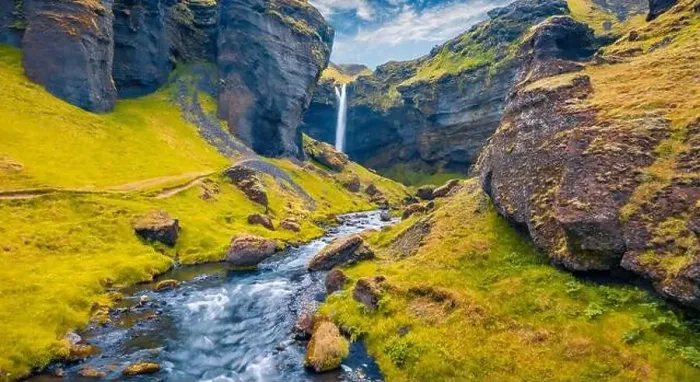 Framed Print : View from flying drone. Yellow grass on the hills on Kvernufoss watterfall Framed Print : View from flying drone. Yellow grass on the hills on Kvernufoss watterfall