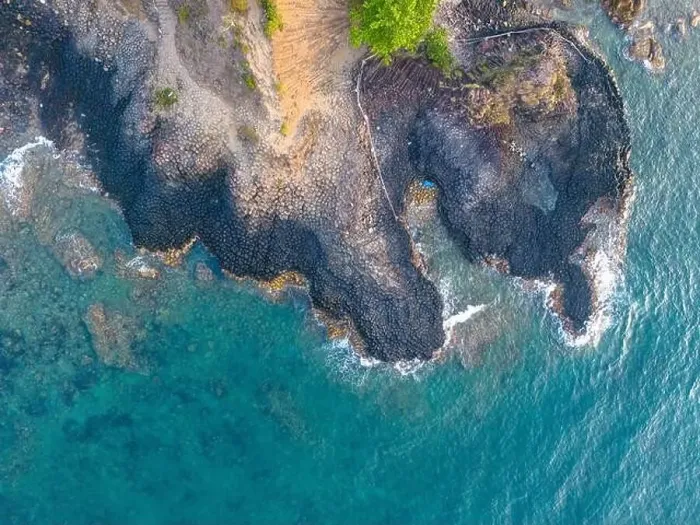 Framed Print : View of Ganh Da Dia or Da Dia Reef is a seashore area of uniformly interlocking basalt rock columns located along