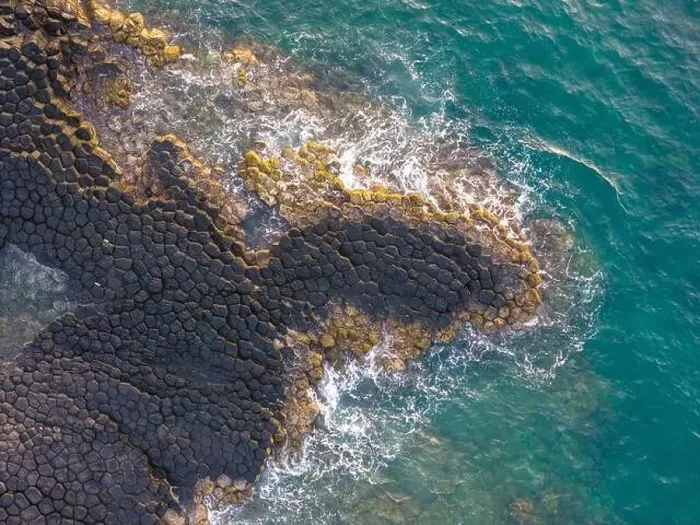 Framed Print : View of Ganh Da Dia or Da Dia Reef is a seashore area of uniformly interlocking basalt rock columns located along