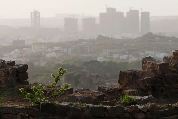 Framed Print : A view from the Golconda Fort of large residential complexes under construction in Hyderabad in India