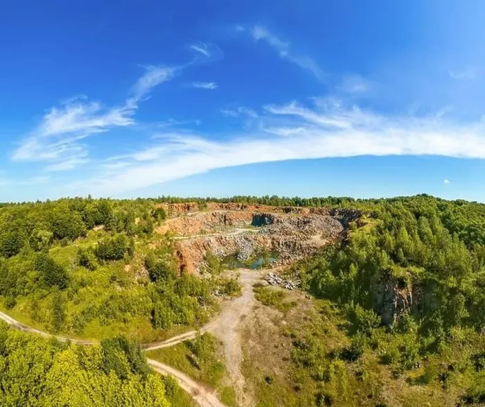 Framed Print : View from above of granite quarry in the forest. Mountain landscape on a summer sunny day Framed Print : View from above of granite quarry in the forest. Mountain landscape on a summer sunny day