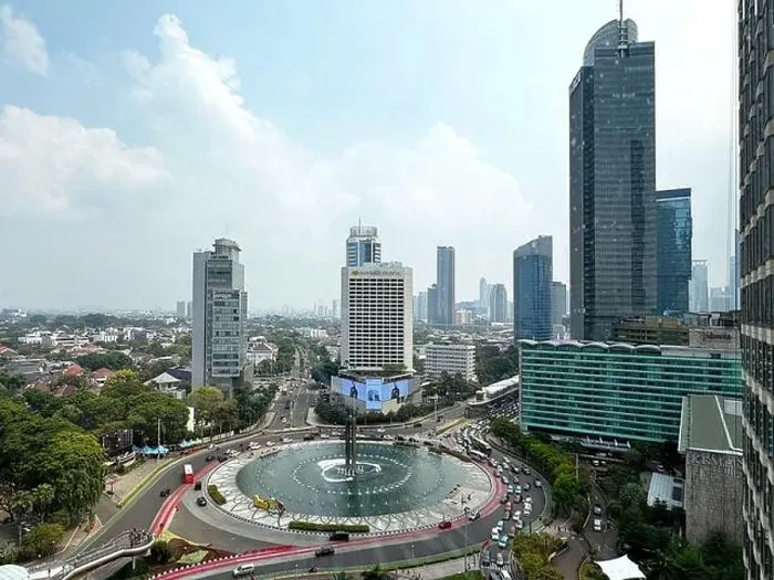 Framed Print : View of Jakarta city centre, the central business district and the famous Bundaran HI roundabout with Jakarta skyscrapers under the sunny blue sky Framed Print : View of Jakarta city centre, the central business district and the famous Bundaran HI roundabout with Jakarta skyscrapers under the sunny blue sky