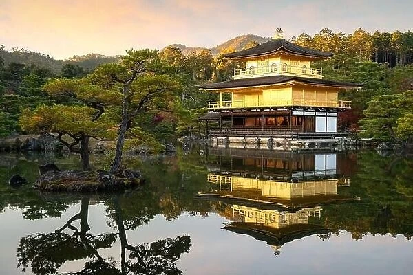 View of Kinkakuji the famous Golden Pavilion with Japanese garden and pond with dramatic evening sky in autumn season at Kyoto, Japan. Japan Landscape