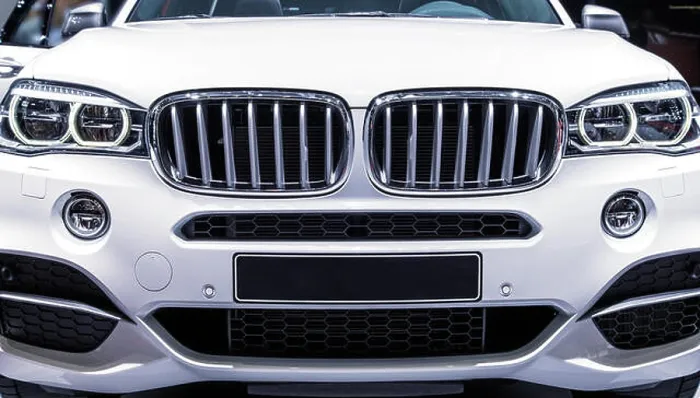 Framed Print : View of the front of a modern SUV of the brand BMW Framed Print : View of the front of a modern SUV of the brand BMW
