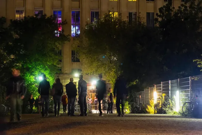 Framed Print : View at night of people waiting outside entrance to famous Berghain nightclub in Friedrichshain Berlin Germany Framed Print : View at night of people waiting outside entrance to famous Berghain nightclub in Friedrichshain Berlin Germany