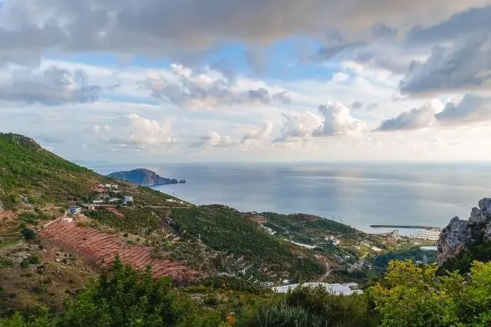 Framed Print : View of the ocean from a mountain showing a port and ships Framed Print : View of the ocean from a mountain showing a port and ships