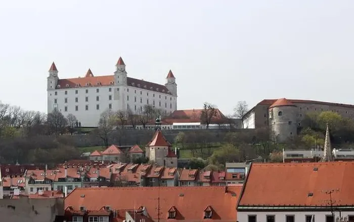 Framed Print : View of the Old Town from the Castle Hill, Bratislava, Slovakia. Street view, old red roofed houses. Spring in Europe Framed Print : View of the Old Town from the Castle Hill, Bratislava, Slovakia. Street view, old red roofed houses. Spring in Europe