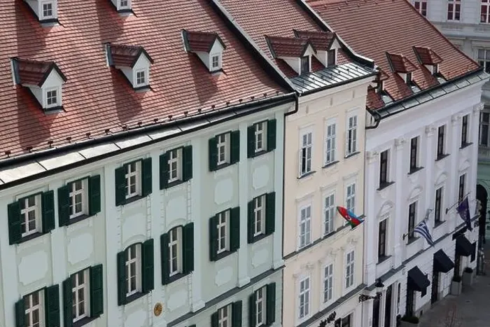 Framed Print : View of the Old Town from the Castle Hill, Bratislava, Slovakia. Street view, old red roofed houses. Spring in Europe Framed Print : View of the Old Town from the Castle Hill, Bratislava, Slovakia. Street view, old red roofed houses. Spring in Europe