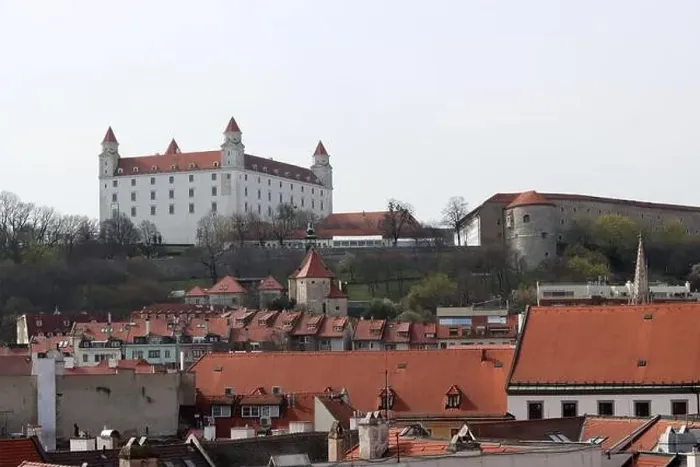 Framed Print : View of the Old Town from the Castle Hill, Bratislava, Slovakia. Street view, old red roofed houses. Spring in Europe Framed Print : View of the Old Town from the Castle Hill, Bratislava, Slovakia. Street view, old red roofed houses. Spring in Europe