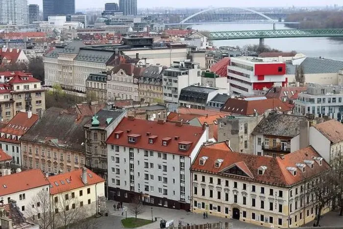 Framed Print : View of the Old Town from the Castle Hill, Bratislava, Slovakia. Street view, old red roofed houses. Spring in Europe Framed Print : View of the Old Town from the Castle Hill, Bratislava, Slovakia. Street view, old red roofed houses. Spring in Europe