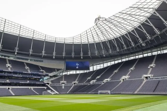 Framed Print : view of the empty pitch and stand of the Tottenham Hotspur football stadium Framed Print : view of the empty pitch and stand of the Tottenham Hotspur football stadium