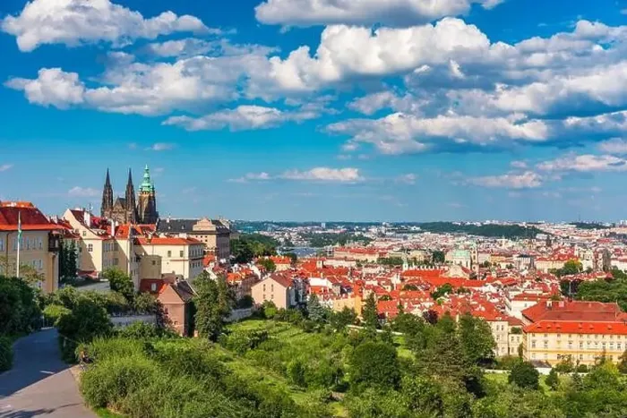 Framed Print : View of Prague featuring historic castle and vibrant rooftops on a sunny day in summer Framed Print : View of Prague featuring historic castle and vibrant rooftops on a sunny day in summer