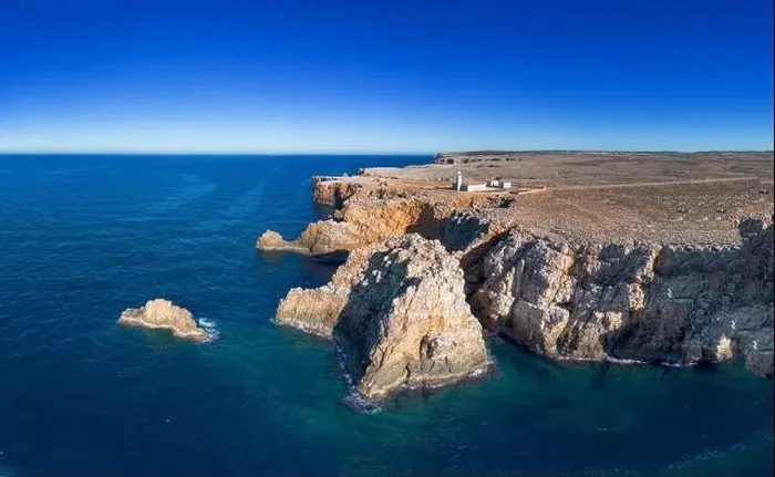 Framed Print : View of the Punta Nati lighthouse and coastal cliffs in northwestern Menorca Framed Print : View of the Punta Nati lighthouse and coastal cliffs in northwestern Menorca
